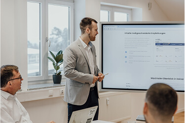 Consultant presenting a process review to a client team